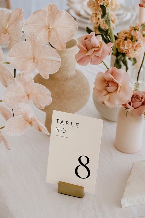 These elegant minimalist wedding table numbers are printable and instantly downloadable. Comes with Table Numbers 1-30, but includes a editable template link where you can create more table numbers and change colors as needed. Minimal Wedding Table, Table Number Template, Wedding Table Numbers Template, Printable Table Numbers, Wedding Table Names, Number Templates, Signing Table Wedding, Wedding Table Number, Table Number Cards