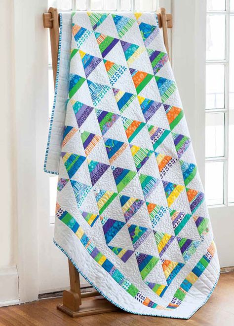 Enjoy the Strippy Pyramids digital pattern from Fons & Porter's Scrap Quilts 2013 issue. Combine colorful strips of fabric with a crisp white to make this cheery pyramid quilt. Use the handy Fons & Porter 60 degree Pyramids Ruler # FPR7894, Quilt Pattern Download, Quilt Modernen, Block Quilt, String Quilts, Jellyroll Quilts, Strip Quilts, Triangle Quilt, Patchwork Quilting, Scrappy Quilts