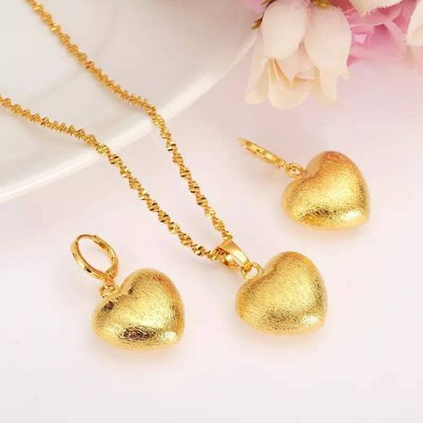 This Jewelry Sets item is sold by DubaiGoldJewelry. Ships from Canada. Listed on Sep 15, 2022 Heart Jewelry Set, Gold Jewelry Sets, Gold Heart Necklace, Wedding Bridal Jewellery, Gold Earrings Designs, Charm Pendant Necklace, Engagement Jewelry, Wedding Jewelry Sets, Bridal Jewelry Sets