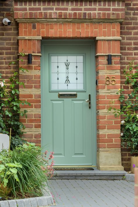 This carousel showcases Solidor's Stirling door in the colour Chartwell Green. The first photo shows the door with Park Lane Bespoke glass and gold hardware. The second photo shows a close up of the gold hardware. The third photo shows a close up of the door being opened and a close up of the glass and gold hardware. Chartwell Green Front Door, Solidor Door, Composite Front Door, Traditional Door, Composite Doors, Green Front Doors, Green Door, External Doors, Park Lane