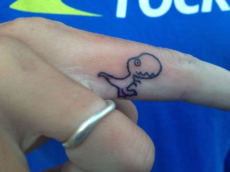 My dinosaur tattoo rexy Rawr Tattoo, Inner Finger Tattoos, Trex Arms, Best Finger Tattoos, Rex Tattoo, Inside Finger Tattoos, Inner Finger Tattoo, T Rex Tattoo, Dinosaur Outline