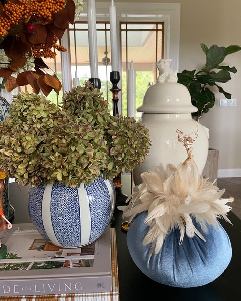 🍂💙🍂 Our ocean blue velvet with cream feathers has been one of the most popular feathered pumpkin this season! I think you can see why! It’s the perfect color combo to match your blue and white porcelain, add some richness and texture to your fall decor. We have these in several sizes available, shown here is the 8” pumpkin. Shop these and more on our website! 🍂💙🍂 Tap the photo to shop 🛍 and FREE 📦shipping on all orders over $50. If you need a link I’m happy to send one, please message me. Y... Blue And White Fall Decor, White Fall Decor, French Country Christmas, Blue Pumpkin, Blue Pumpkins, White Pumpkins, Country Christmas, Color Combo, Ocean Blue