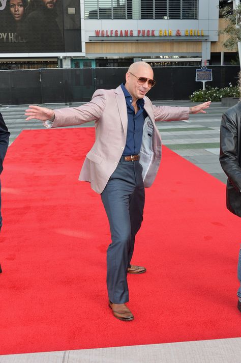 Rumor has it he owns 77,000 suits. | Why Pitbull Is Actually Great And We Should All Love Him Pitbull Outfits, Pitbull Singer, Pitbull The Singer, Armando Christian Perez, Pitbull Images, Pitbull Photos, Singer Style, Pitbull Rapper, Country Mens Fashion