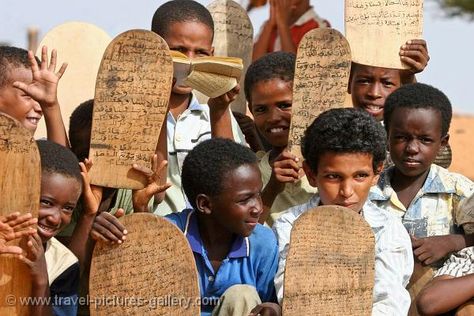 Mauritanian children learning the Qu'ran on a wooden Luha board. Somali Aesthetic, Geography Project, Ethnic Background, Horn Of Africa, Children Learning, Unique Faces, Out Of Africa, Calligraphy Script, 11th Century