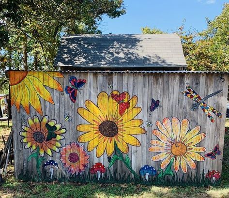 Flowers Painted On Fences, Shed Painting Ideas Flowers, Outdoor Wall Art Ideas Creative, Flower Fence Painting, Fence Painting Ideas Diy Projects, Fence Mural Ideas Backyards Diy, Outdoor Fence Mural Ideas, Garden Mural Outdoor Wall Art Easy, Painted Garden Fence Art