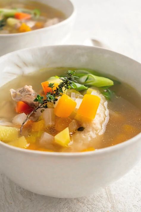 Jamaican Chicken Soup Made With Dumplings & Fresh Ingredients Jamaican Chicken Soup, Chicken Soup Recipes Homemade, Jamaican Chicken, Chicken Dumpling Soup, Homemade Chicken Soup, Scotch Bonnet, Soup Mixes, Chicken Soup Recipes, Winter Squash