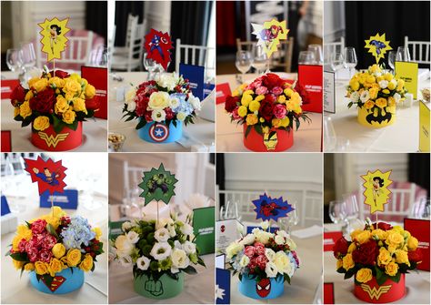 Super Heroes floral centerpiece Marvel Quinceanera Theme, Super Hero Wedding Theme, Comic Book Centerpieces, Avengers Themed Wedding, Marvel Wedding Centerpieces, Super Hero Centerpiece, Marvel Centerpieces, Marvel Centerpiece Ideas, Marvel Wedding Ideas