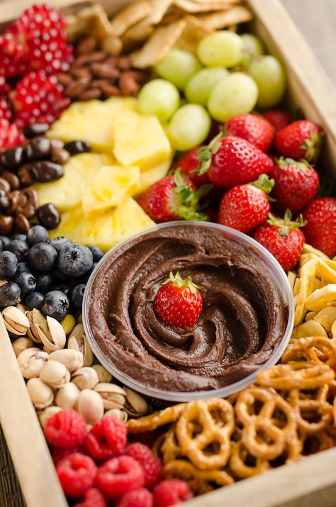 Healthy Fruit & Chocolate Party Tray is a fantastic appetizer for your next get-together. A wholesome mix of fruit, nuts, pretzels and Dark Chocolate Hummus Dark Chocolate Hummus, Healthy Potluck Recipes, Appetizers Fruit, Healthy Potluck, Chocolate Hummus, Healthy Finger Foods, Fruit Chocolate, Party Tray, Dip Tray