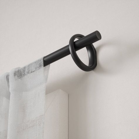 With a modern metal rod and included decorative ring-shaped wall bracket, Ringlet utilizes a modern design with an industrial and eye-catching twist. Made of steel, this curtain rod is durable while remaining attractive in design. Includes all necessary mounting hardware for an easy installation. Ringlet curtain 1" (2.5cm) diameter rod is adjustable to fit a wide range of windows, from 42-120" (107-305cm), and supports curtain sets weighing up to 22lbs. (10kg). EU Design 015018195-0002 Minimal Curtains, Paradise Decor, Industrial Curtain Rod, Modern Curtain Rods, Curtain Rods And Hardware, Black Curtain Rods, Unique Curtains, Mirrored Picture Frames, Double Rod Curtains