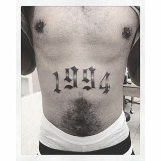 1995 Stomach Tattoo, Number Tattoo On Stomach, Stomach Number Tattoo, Name On Stomach Tattoo, 1994 Lettering Tattoo, Stomach Tattoos For Guys Words, Stomach Writing Tattoo, Stomach Lettering Tattoos Men, Stomach Tattoos For Guys Lower