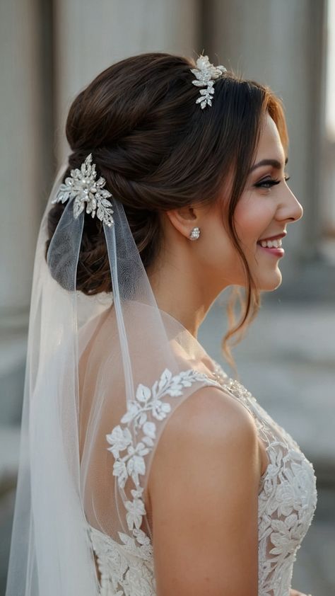 Discover the latest bridal hairstyles with veil for 2024 From elegant updos cascading long hair and chic tiara styles to simple crown braids and modern black hairstyles for short hair find the perfect look for your special day Whether you prefer a classic updo bun or a half-up hairdo we've got you covered with inspiration for your wedding hairstyle Black Hairstyles For Short Hair, Latest Bridal Hairstyles, Bridal Hairstyles With Veil, Updo Buns, Cherry Cola Hair Color, Bridal Updo With Veil, Sophisticated Updo, Bride Hairstyles With Veil, Cherry Cola Hair