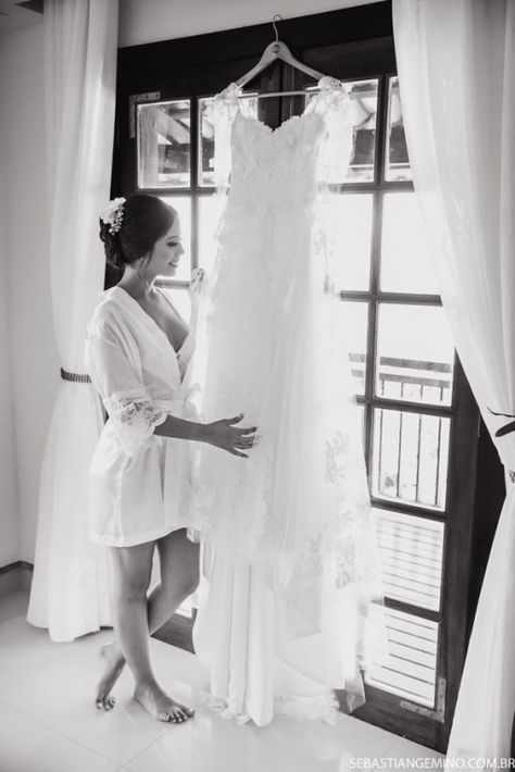 Foto de noiva no making of com seu vestido de noiva. #vestidodenoiva #weddingparties #pre #wedding #parties Wedding Preparation Photos, Wedding Dress Hanging, Love Citation, Bride Preparation, Foto Wedding, Bridal Photography Poses, Wedding Details Photography, Bridal Prep, Wedding Picture Poses