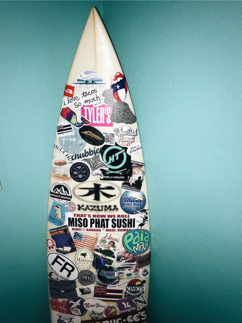 surfboard with stickers really cute room decor diy old surfboard Stickers On Surfboard, Surfboard Stickers Surf Boards, Surfboard Design Aesthetic, Surfboard With Stickers, Cool Surfboard Designs, Surfboard Art Decor, Cute Room Decor Diy, Old Surfboard, Surfboard Stickers