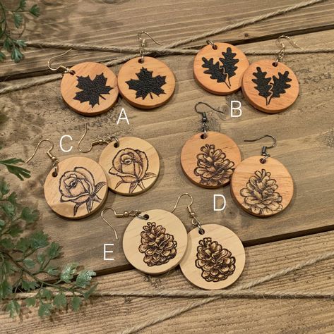 "These hand woodburned earrings measure 1-3/8\" in diameter with various type of metal finish hooks. Each earring receives 3-4 coats of polyurethane to protect them. These earrings look great and make a great gift! Price is per pair." Wood Carved Earrings, Woodburned Earrings, Wood Leaf, Wood Burn Designs, Laser Cut Wood Earrings, Wood Dangle Earrings, Leaf Flower, Tatting Patterns, Wood Carved