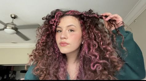 Pink hair with brown highlights balayage Pink Brown Curly Hair, Brown Hair Pink Highlights Curly, Curly Brown Hair With Pink Highlights, Color Highlights Curly Hair, Pink Highlights In Brown Hair Curls, Pink Highlights In Brown Curly Hair, Curly Pink Highlights, Curly Hair Pink Highlights, Curly Hair With Pink Highlights