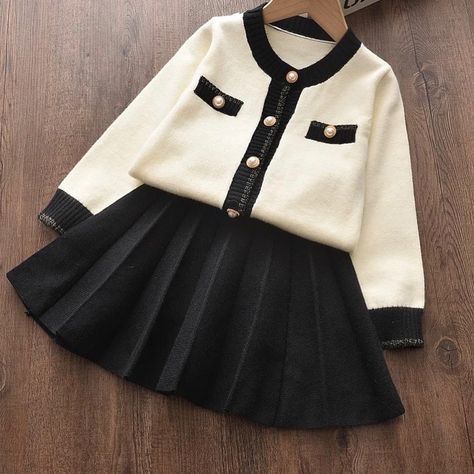 Blush Chérie on Instagram: “Chic and Classic Skirt set 🤍🖤 Chanel-esque Elegance!!!✨ Shine away lil doll 🌸🤍 Available 2 to 6yrs Swipe right - Dm💌 #kidswear…” Winter Clothes Kids, Baby Winter Clothes, Winter Baby Girl, Luxury Baby Clothes, Kids Fall Outfits, Kids Winter Outfits, Sweater Skirt Set, Baby Girl Clothes Winter, Winter Baby Clothes