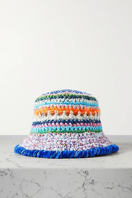 A multi-color crochet bucket hat. 2024 Crochet Trends, Crochet Bucket Hat Free Pattern, Crochet Hats For Boys, Net Sustain, Bucket Hat Pattern, Crochet Summer Hats, Hello Kitty Crochet, Crochet Sun Hat, Summer Dressing