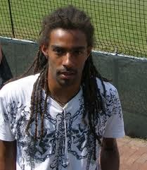 Dustin Brown  German tennis looking great Brown Tennis, Dustin Brown, Professional Tennis Players, Tennis World, Sports Personality, Entertainment Music, Wimbledon, Tennis Players, Good Looking Men