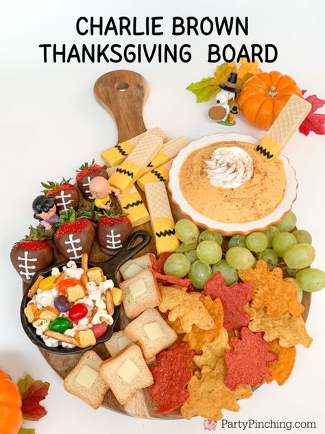 charlie brown thanksgiving board dinner charcuterie snack grazing board, best thanksgiving charcuterie board for kids, charlie brown snoopy food, charlie brown snoopy party ideas, charlie brown thanksgiving dinner ideas, best charlie brown thanksgiving theme food ideas, easy best kids charcuterie, best easy snack grazing charcuterie board for thanksgiving Charlie Brown Charcuterie Board, Thanksgiving Snack Board For Kids, Peanuts Thanksgiving Party, Thanksgiving Charcuterie Board For Kids, Thanksgiving Party Food For Kids, A Charlie Brown Thanksgiving, Snoopy Charcuterie, Charlie Brown Thanksgiving Feast, Charlie Brown Thanksgiving Dinner