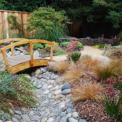 River Rock Gardens | bridge over rock river | Flower Garden Garden Bridge Design, Boho Sunroom, Backyard Bridges, Garden Bridges, Bridge Ideas, Dry River, Asian Landscape, Asian Garden, Creek Bed