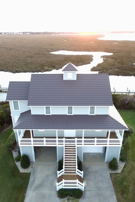 Stunning beach house in the Outer Banks of North Carolina with a beautiful metal roof designed to withstand even the harshest coastal conditions | Install by McCarthy Metal Roofing Home With Metal Roof, Metal Roof Shingles, Aluminum Shingles, Metal Shingle Roof, Manteo Nc, Metal Roof Panels, Metal Roofing Systems, Sheet Metal Roofing, Roofing Ideas