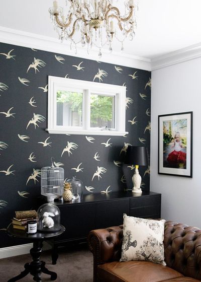 Beautiful living room space decorated with a tufted leather couch, black furniture, carpeted floors and one wall covered in swallow wallpaper by Sanderson | Photos by Lisa Atkinson Photographer Sanderson Swallows Wallpaper, Mudroom Wallpaper, Swallow Wallpaper, Swallows Wallpaper, Sanderson Wallpaper, Brown Accent Wall, Couch Black, Eclectic Maximalism, Living Room Plan