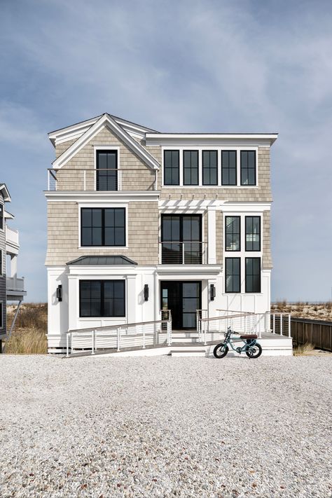 Oceanside | contemporary design | gray exterior - Design/Build: Marnie Oursler  Dealer: Atlantic Millwork Featured Products: Modern Multi-Slide Doors, Elevate Casement Windows, Elevate Awning Windows, Elevate Direct Glaze Windows, and Ultimate Swinging Door Glaze Windows, Bethany Beach Delaware, Marvin Windows And Doors, Slide Doors, Transitional Coastal, Gray Exterior, Marvin Windows, Awning Windows, Dog Washing Station