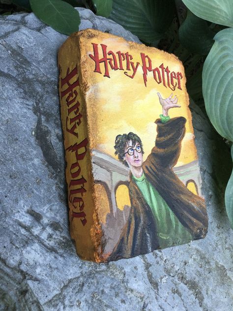 Book Bricks, Brick Book Painting, Painted Bricks For Garden, Book Cover Painted Bricks, Book Themed Painted Rocks, Painted Bricks, Painting Bricks Like Books, Painted Brick Books, Brick Painting Ideas Craft