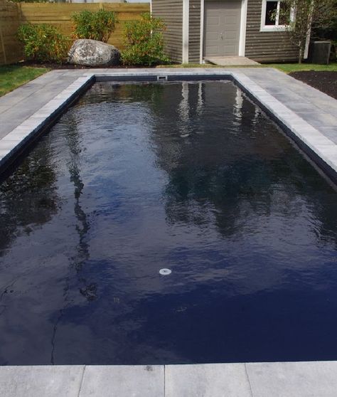 Volcanic Black is quickly becoming one of Imagine Pools' favorite colors and you can see why this reflective color is so appealing - like this look on our Freedom design.  Ask your local Imagine Pools dealer to show you a sample and make your plans to enjoy your own swimming pool in 2018. Pool Color Ideas, Imagine Pools, Pool Paint, Black Pool, Swimming Pool Decks, Fiberglass Swimming Pools, Pool Colors, Gunite Pool, Blue Pool