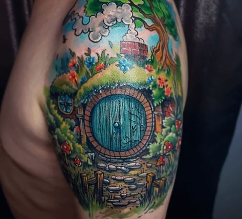 Little Piece Of The Shire Tattoo The Shire Tattoo, Hobbit Hole Tattoo, Tree Of Gondor Tattoo, Gandalf Tattoo, Hole Tattoo, Hobbit Tattoo, Drake Tattoos, Tolkien Tattoo, Olive Tattoo