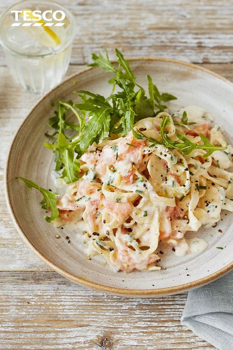 Feel indulgent with this creamy smoked salmon pasta recipe, a gorgeous midweek meal when you need a bit of a treat. Ready in under half an hour, this tagliatelle recipe has a simple yet delicious sauce of crème fraîche, lemon and smoked salmon. | Tesco Salmon Tagliatelle Recipes, Salmon Recipes Simple, Lemon Tagliatelle, Tagliatelle Recipes, Healthy Pancakes Oatmeal, Smoked Salmon Pasta Recipes, Salmon Tagliatelle, Salmon Pasta Recipe, Pasta Salmon