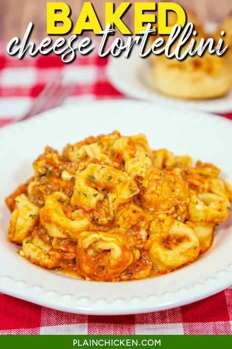 Cheesy Baked Tortellini recipe – the ultimate comfort food! Italian sausage, tortellini pasta, marinara sauce, water, mozzarella, and parmesan cheese. No need to boil the pasta! Serve with a salad and some garlic bread. Add this delicious pasta recipe to your menu the next time you need an easy weeknight meal. Baked Cheese Tortellini, Frozen Tortellini, Baked Tortellini Casserole, Plain Chicken Recipe, Cheese Tortellini Recipes, Baked Pasta Dishes, Tortellini Bake, Pasta Meals, Tortellini Recipes