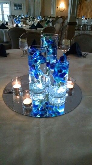 Table Flowers Arrangements, Centerpieces Orchids, Wedding Centerpieces Blue, Prom Centerpieces, Flowers Arrangements Wedding, Blue Floating Candles, Royal Blue Centerpieces, Centerpieces Blue, Blue Orchid Wedding