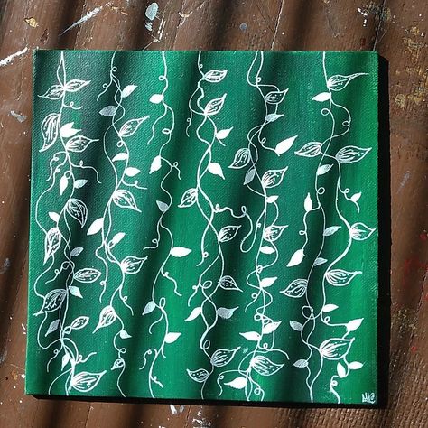 green background with white vines and leaves going vertically down the canvas. Paintings With White Background, Green Theme Painting Ideas, Greenery Painting Acrylic Easy, Green Background Painting Ideas, Green Painting Ideas On Canvas, Green Painting Ideas Art Easy, Painting Green Background, Painting Ideas On Canvas Green, Green And White Painting