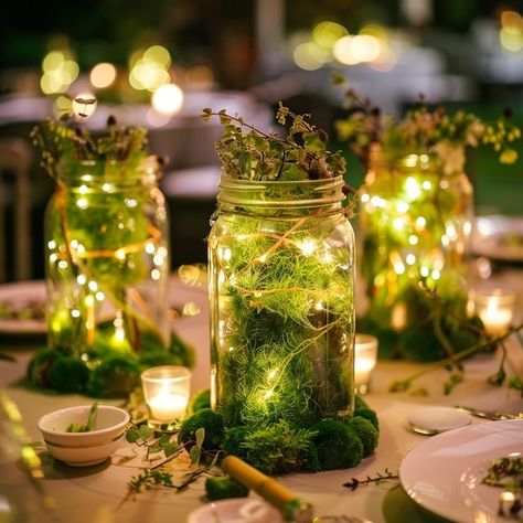 DIY: Create Charming Centerpieces Using Fairy Lights, Mason Jars, and Moss – Sarah Romanowski Wedding Design Mason Jars With Fairy Lights, Celtic Handfasting Ceremony, Moss Centerpiece Wedding, Jars With Fairy Lights, Forest Centerpieces, Fairy Lights For Wedding, Enchanted Forest Centerpieces, Fire And Ice Theme, Dark Forest Wedding