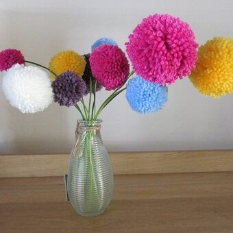 Pom Pom Flower, Clover Pom Pom Maker, Pom Flowers, Pom Pom Flowers, Pom Pom Maker, Lamb Decorations, Pom Pom Crafts, Hanging Flower Wall, Wool Crafts