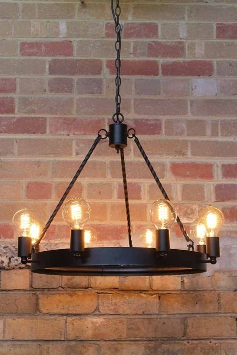 Industrial Brewery, Urban Restaurant, Lodge Chandelier, Black Dining Room Table, Gothic Industrial, Black Metal Rings, Suit Traditional, Lodge Hotel, Country Lodge