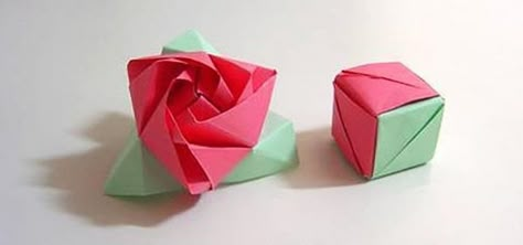 In the words of Gertrude Stein, a rose is a rose is a magic paper cube. And with this paper folder's guide, you'll learn how to make your very own magic rose cube from paper using the Japanese art of origami. This design by Jo Nakashima is great for Valentine's Day or any other day where a paper puzzle rose is needed. Video: . Origami Kutu, Origami Roses, Origami Leaves, Magic Rose, Origami Cube, Paper Cube, Tutorial Origami, Flower Step By Step, Origami Ball