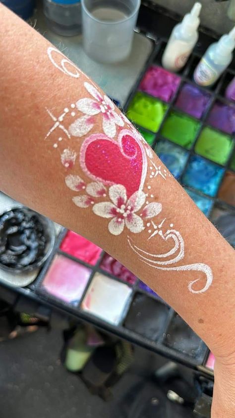 Eye Face Paint, Face Paint On Arm, Facepainting Arm Designs, Face Painting Aesthetic Flowers, Face Painting Nature Theme, Flowers Facepainting, Face Art Painting, Eye Face Painting, Cheek Art