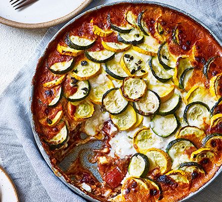 Transform ratatouille into a bake with a layer of cheese sauce and you won't look back. It makes a great late summer dish and delivers three of your 5-a-day Ratatouille Au Four, Baked Ratatouille Recipe, Baked Ratatouille, Batch Cooking Recipes, Vegetarian Roast, Ratatouille Recipe, Ricotta Gnocchi, Easy Summer Dinners, Goat Cheese Recipes