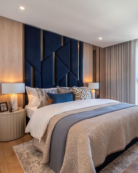 Our soft furnishings add an extra layer of comfort and luxury to this principal bedroom, while a chic chair from French designer @moustache_editions infuses the space with some Parisian flair. Photo credit: @tonymurraypho #dapaatelier #interiordesign #onethamesquay #bedroomdesign Blue Velvet Headboard Bedroom, Velvet Headboard Bedroom, Blue Velvet Headboard, Blue Headboard, Sleek Desk, Chic Chair, Velvet Headboard, Bedroom Headboard, Velvet Chair