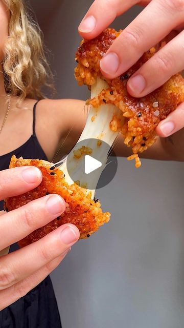 madeleine on Instagram: "CHEESY GOCHUJANG ONIGIRI 🍙💥 served with a sriracha mayo dip 

There’s really not much else to say after you’ve seen that cheese pull tbh x

Ingredients: 

Sushi rice (roughly 100-125g cooked sushi rice per onigiri) 
Gochujang 
Rice wine vinegar 
Soy sauce 
Sesame seeds 
Cheese - I used “pizza mozzarella” as it’s good for melting 
Neutral cooking oil

Recipe: 

Cook sushi rice and allow to cool. Season generously with a splash of rice vinegar, soy sauce, 1-2 tsp gochujang. Add a sprinkle of sesame seeds. 

Fill the mould with the sushi rice, adding cubed mozeralla in the middle. 

In a non stick pan over a medium low heat, add a drizzle of neutral oil and gently pan fry each side until slightly golden and crispy.

Finish with optional chilli flakes for extra spice Gochujang Rice, Cook Sushi Rice, Cooked Sushi, Mayo Dip, Cheese Pull, Sriracha Mayo, Pan Fry, Rice Wine Vinegar, Rice Wine