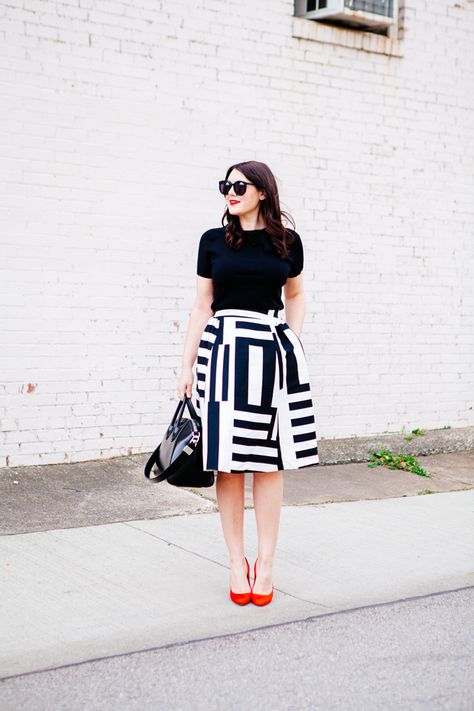 Black And White Combination Outfits, Black Patterned Skirt Outfit, White And Black Skirt Outfit, Bold Pattern Outfit, Black White Skirt Outfit, Black Top With Skirt, Black White And Red Outfits, Patterned Skirt Outfit, Black And White Skirt Outfit