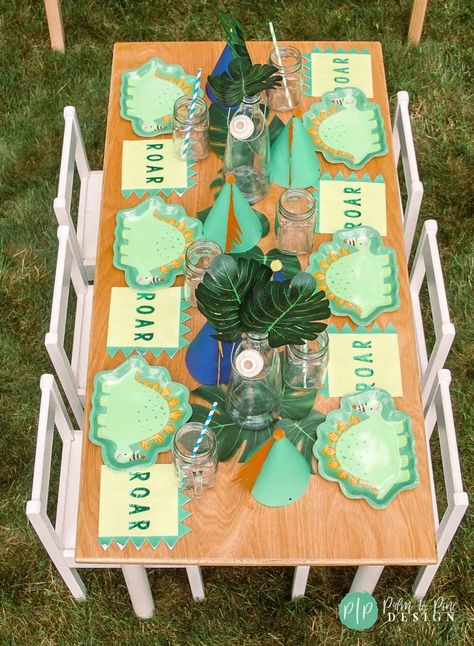 dinosaur birthday drinks, dino table setting, dinosaur birthday party ideas, dinosaur birthday banner, dino drink station Dinosaur Table Setting, Dinosaur Party Table, Dinosaur Party Plates, Birthday Party Boys, Kids Party Planning, Birthday Plates, Boy Birthday Party Themes, Dino Birthday Party, Cowgirl Birthday Party