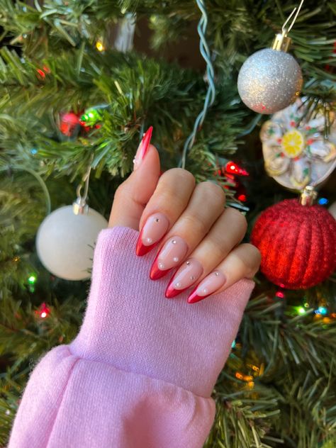 Red Chrome Christmas Nails French, Chrome French Tip Nails Christmas, Red Acrylic Nails Diamonds, Pearl Nails Christmas, Red Tip Nails With Pearls, Red French Pearl Nails, Christmas Nails Pearls, Holiday Nails With Gems, Red Nails With Chrome Tips