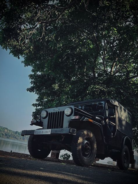 The Nanicheri River can be seen in the background, and the village is located in Kannur, a district in the Indian state of Kerala. And the picture's features a classic Mahindra Jeep. Mahindra Jeep, Kerala, Jeep, Bike, Quick Saves