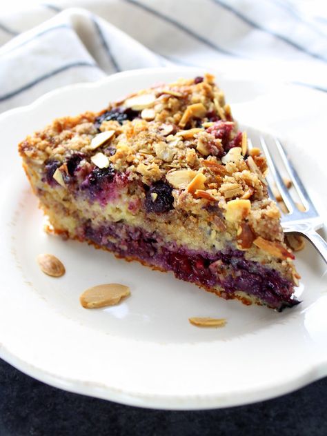 Triple Berry Blender Cake Recipe Image Gluten Free Oat-Based Cake Blueberry Crumble Cake, Blender Cake, Crumble Cake Recipe, Pumpkin Bagels, Blender Recipe, Crumble Cake, Blueberry Crumble, Berry Cake, Spring Desserts