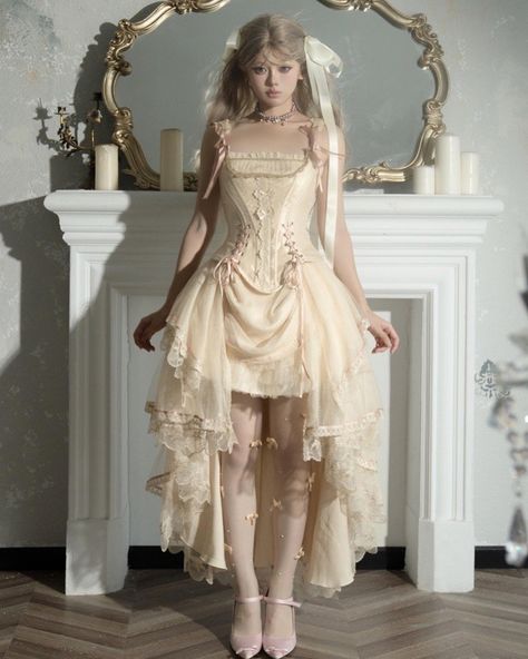 🥂🥂Champagne princess Lolita dress with lace-up details design. 🧚‍♀️🧚‍♀️Full set includes boned corset top, layered high-low skirt. 🤩🤩Price: $99.50 👉👉Search' CARA-045' on devilinspired.com #devilinspired #princessdress #lolitacoord #eglcommunity #lolitadresses #princesslolita High Low Skirt Outfit, Plus Size Goth Fashion, Outfit With Corset, Corset With Skirt, Fairycore Fashion, Plus Size Kawaii, Hi Low Skirts, Corset Outfit, Princess Core