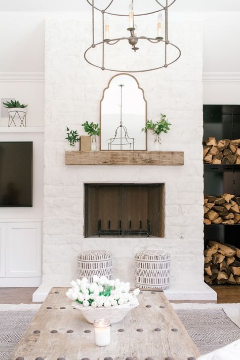 A Coastal Farmhouse in White Done SO Right Read More: https://www.stylemepretty.com/living/2018/07/16/a-coastal-farmhouse-in-white-done-so-right/ Farmhouse Fireplace Ideas, Coastal Farmhouse Living Room, Living Room Reveal, Farmhouse Fireplace, Farmhouse Remodel, Coastal Living Rooms, Coastal Farmhouse, Natural Home Decor, Cool Ideas