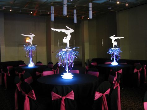 Custom themed centerpieces with LED light bases at the Crown Plaza North Shore by The Prop Factory Bat Mitzvah Centerpieces, Sports Party Centerpieces, Mitzvah Centerpieces, Crown Centerpiece, Themed Centerpieces, Banquet Centerpieces, Cheer Banquet, Sports Themed Wedding, Gymnast Birthday Party